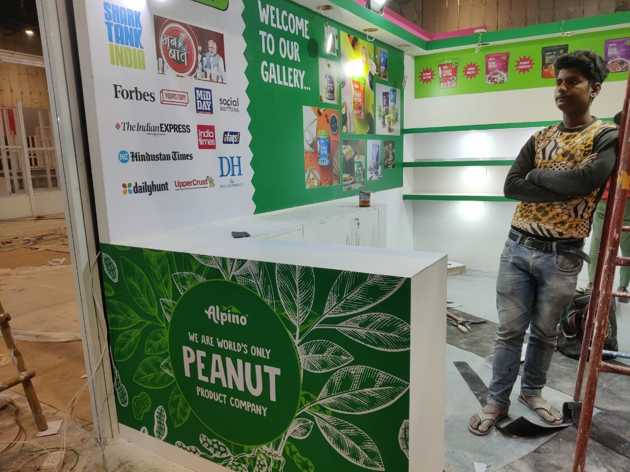 Alpino stall during installation with the wrapped counter in place and shelves still empty