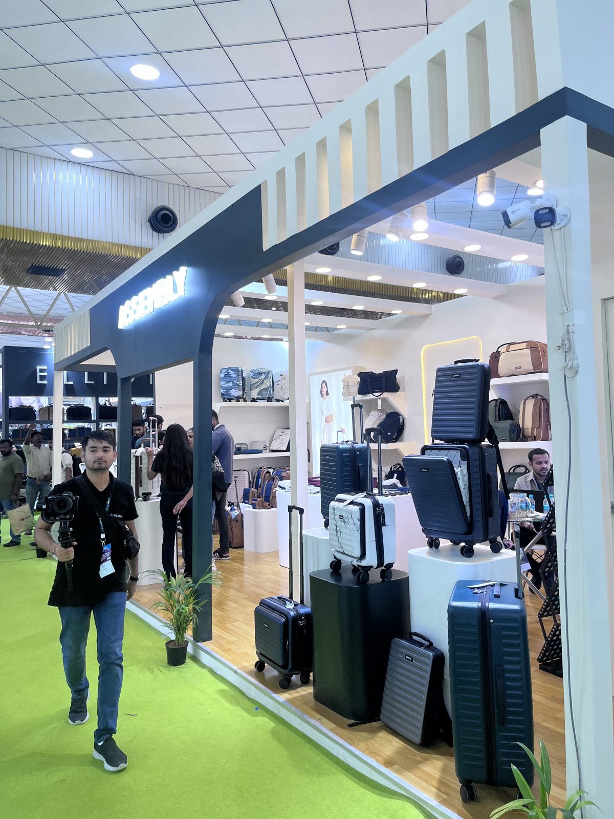 Assembly stall side with luggage display and lit arch