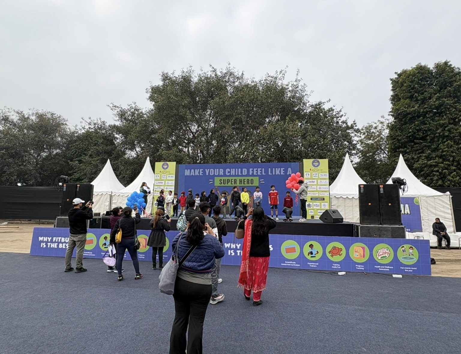 Main stage at The Great Indian Fitness Carnival with families in front