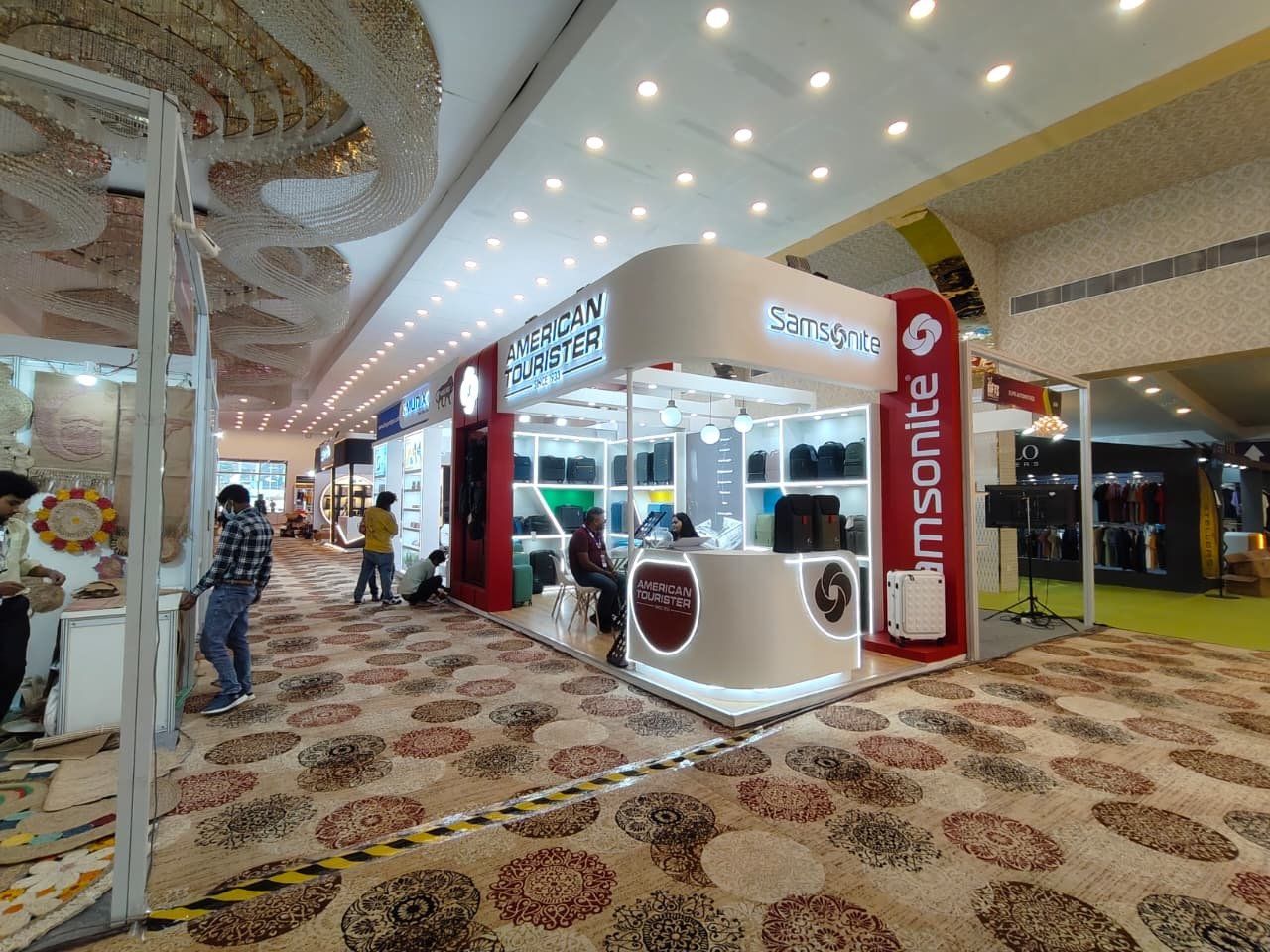Wide view of the Samsonite and American Tourister corner stall in the hall