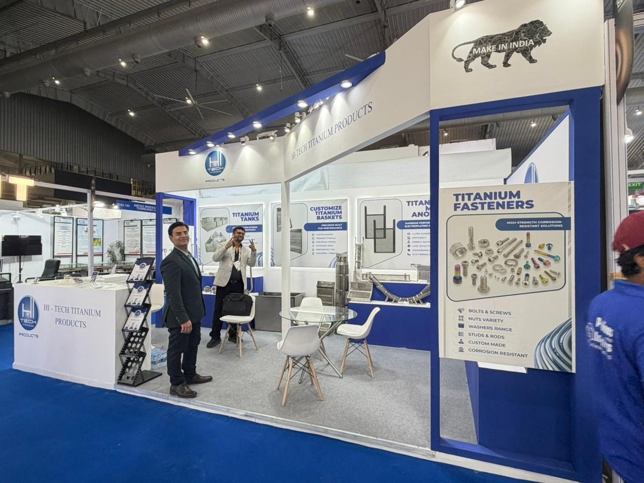 Titanium fasteners stall with blue frame, product panels and seating
